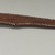 Menominee. <em>Ball-headed War Club with Spike</em>, early 19th century. Wood, brass nail studs, pigment, 24 1/4 in. (61.6 cm). Brooklyn Museum, Henry L. Batterman Fund and the Frank Sherman Benson Fund, 50.67.61. Creative Commons-BY (Photo: Brooklyn Museum, CUR.50.67.61_view1.jpg)
