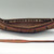 Sioux. <em>Model of Dug-out Canoe and Paddle</em>, early 19th century. Cedar, pigment, canoe: 7 x 26 1/8 x 4 in. (17.8 x 66.4 x 10.2 cm). Brooklyn Museum, Henry L. Batterman Fund and the Frank Sherman Benson Fund, 50.67.64a-b. Creative Commons-BY (Photo: Brooklyn Museum, CUR.50.67.64a-b.jpg)