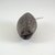  <em>Charm (Marupai)</em>. Coconut, 7/8 x 13/16 x 1 15/16 in. (2.3 x 2 x 5 cm). Brooklyn Museum, Gift of John W. Vandercook, 51.118.17. Creative Commons-BY (Photo: Brooklyn Museum, CUR.51.118.17_front_PS5.jpg)