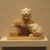  <em>Lion Holding Vessel</em>, 525-404 B.C.E. Egyptian alabaster (calcite), 4 x 4 3/4 x 2 in. (10.2 x 12.1 x 5.1 cm). Brooklyn Museum, Charles Edwin Wilbour Fund, 53.223. Creative Commons-BY (Photo: Brooklyn Museum, CUR.53.223_wwg8.jpg)