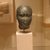  <em>Idealized Head</em>, ca. 300 B.C.E. Basalt, 4 13/16 x 3 1/16 x 4 1/2 in. (12.3 x 7.7 x 11.5 cm). Brooklyn Museum, Charles Edwin Wilbour Fund, 55.178. Creative Commons-BY (Photo: Brooklyn Museum, CUR.55.178_wwg8_2010.jpg)