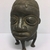 Edo. <em>Head Shaped Receptacle</em>, late 19th or early 20th century. Copper alloy, 6 7/8 × 4 1/8 in. (17.5 × 10.5 cm). Brooklyn Museum, Gift of Arturo and Paul Peralta-Ramos, 56.6.65. Creative Commons-BY (Photo: , CUR.56.6.65_front.jpg)