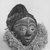 Pende (Western). <em>Mask (Mbuya)</em>, late 19th-early 20th century. Wood, pigment, fiber, raffia, 13 x 7 1/4 x 13 1/2 in. (33.0 x 18.4 x 34.3 cm). Brooklyn Museum, Gift of Arturo and Paul Peralta-Ramos, 56.6.6. Creative Commons-BY (Photo: Brooklyn Museum, CUR.56.6.6_print_threequarter_bw.jpg)