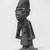 Yorùbá artist. <em>Male twin figure (Ère Ìbejì)</em>, late 19th or early 20th century. Wood, 10 3/8 x 4 in. (26.4 x 10.3 cm). Brooklyn Museum, Gift of Arturo and Paul Peralta-Ramos, 56.6.83. Creative Commons-BY (Photo: Brooklyn Museum, CUR.56.6.83_print_threequarter_bw.jpg)