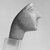  <em>Head of Woman</em>, ca. 1353-1075 B.C.E. Glass, 2 1/2 x 1 9/16 x 2 13/16 in. (6.4 x 4 x 7.1 cm). Brooklyn Museum, Charles Edwin Wilbour Fund, 57.164. Creative Commons-BY (Photo: Brooklyn Museum, CUR.57.164_negC_bw.jpg)
