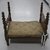 American. <em>Miniature Four Poster Bed</em>, early 19th–mid 19th century. Wood (cherry?); cotton, wool, other textile, 20 x 14 1/2 x 19 in. (50.8 x 36.8 x 48.3 cm). Brooklyn Museum, Gift of Mrs. Charles E. Rogers, Jr., 57.181.2a-b. Creative Commons-BY (Photo: Brooklyn Museum, CUR.57.181.2_view1.jpg)