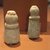  <em>Model Jar on Stand</em>, ca. 3200-2675 B.C.E. Faience, 2 9/16 x Diam. 13/16 in. (6.5 x 2 cm). Brooklyn Museum, Charles Edwin Wilbour Fund, 58.128.2. Creative Commons-BY (Photo: Brooklyn Museum, CUR.58.128.2_58.128.3_erg3.jpg)