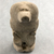  <em>Statuette of a Seated Cynocephalus Ape</em>. Limestone, 2 15/16 × 1 7/16 × 1 5/16 in. (7.4 × 3.6 × 3.4 cm). Brooklyn Museum, Charles Edwin Wilbour Fund, 58.32.2. Creative Commons-BY (Photo: , CUR.58.32.2_front04.jpg)