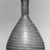  <em>Flask with Spiral Trailing</em>, 4th century C.E. Glass, 4 x Diam. 2 9/16 in. (10.2 x 6.5 cm). Brooklyn Museum, Charles Edwin Wilbour Fund, 59.199.4. Creative Commons-BY (Photo: Brooklyn Museum, CUR.59.199.4_negA_bw.jpg)