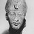  <em>Head of Akhenaten</em>. Limestone, pigment, 8 3/8 x 7 3/16 in. (21.3 x 18.3 cm). Brooklyn Museum, Gift of Maguid Sameda, 59.4. Creative Commons-BY (Photo: Brooklyn Museum, CUR.59.4_NegID_L96_25_print_bw.jpg)