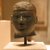 Egyptian. <em>Head of a Kushite Ruler</em>, ca. 716-702 B.C.E. Green schist, 2 3/4 x 2 1/16 x 2 9/16 in. (7 x 5.3 x 6.5 cm). Brooklyn Museum, Charles Edwin Wilbour Fund, 60.74. Creative Commons-BY (Photo: Brooklyn Museum, CUR.60.74_wwg8.jpg)