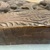 Maori. <em>Door lintel (Pare or Korupe)</em>, ca. 1850. Wood, pāua shell, 13 1/2 x 35 1/8 x 1 7/8 in. (34.3 x 89.2 x 4.8 cm). Brooklyn Museum, Frank L. Babbott Fund and Carll H. de Silver Fund, 61.126. Creative Commons-BY (Photo: , CUR.61.126_base01.jpg)