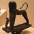  <em>Striding Sphinx</em>, ca. 945-712 B.C.E. Bronze, 5 1/2 x 1 5/8 x 5 in. (14 x 4.1 x 12.7 cm). Brooklyn Museum, Charles Edwin Wilbour Fund, 61.20. Creative Commons-BY (Photo: Brooklyn Museum, CUR.61.20_wwg8.jpg)