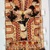Maina. <em>Tunic</em>, 20th century. Bark cloth, pigment, feathers, seeds, bird bones, resin, 33 1/2 × 15 3/4 × 1 1/4 in. (85.1 × 40 × 3.2 cm). Brooklyn Museum, Caroline A.L. Pratt Fund, 61.35. Creative Commons-BY (Photo: Brooklyn Museum, CUR.61.35_view01.jpg)