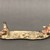 <em>Canoe with Two Seated Figures</em>, ca. mid-20th century. Ceramic, pigment, 11 7/16 x 2 3/8 x 3 9/16 in. (29.0 x 6.0 x 9.0 cm). Brooklyn Museum, Gift of Ingeborg de Beausacq, 62.180.27. Creative Commons-BY (Photo: Brooklyn Museum, CUR.62.180.27_view03.jpg)