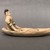 Karaja. <em>Figurine Seated in Canoe with Fish</em>, ca. mid-20th century. Ceramic, pigment, 8 x 2 1/4 x 4 1/4 in. (20.3 x 5.7 x 10.8 cm). Brooklyn Museum, Gift of Ingeborg de Beausacq, 62.180.28. Creative Commons-BY (Photo: Brooklyn Museum, CUR.62.180.28_view01.jpg)