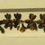Nasca. <em>Mantle, Edge Embellishment, Fragment or Mantle?, Border, Fragment</em>, 200-600 C.E. Cotton, camelid fiber, 2 1/4 × 1/8 × 18 1/2 in. (5.7 × 0.3 × 47 cm). Brooklyn Museum, Gift of Adelaide Goan, 64.114.21 (Photo: , CUR.64.114.21.jpg)