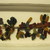 Nasca. <em>Mantle, Edge Embellishment, Fragment or Mantle?, Border, Fragment</em>, 200-600 C.E. Cotton, camelid fiber, 2 1/4 × 1/8 × 18 1/2 in. (5.7 × 0.3 × 47 cm). Brooklyn Museum, Gift of Adelaide Goan, 64.114.21 (Photo: , CUR.64.114.21_detail01.jpg)