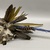 Karaja. <em>Headdress</em>, 20th century. Feathers (brown, white, blue, yellow), plant fibers, 11 1/4 × 23 × 13 1/2 in. (28.6 × 58.4 × 34.3 cm), on storage support. Brooklyn Museum, A. Augustus Healy Fund, 64.214.1. Creative Commons-BY (Photo: Brooklyn Museum, CUR.64.214.1_view02.jpg)