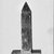  <em>Obelisk</em>, ca. 1075-332 B.C.E. Glass, 2 5/16 × 11/16 × 11/16 in. (5.9 × 1.8 × 1.8 cm). Brooklyn Museum, Charles Edwin Wilbour Fund, 65.134.2. Creative Commons-BY (Photo: Brooklyn Museum, CUR.65.134.2_NegB_inverted_bw.jpg)
