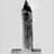  <em>Obelisk</em>, ca. 1075-332 B.C.E. Glass, 2 5/16 × 11/16 × 11/16 in. (5.9 × 1.8 × 1.8 cm). Brooklyn Museum, Charles Edwin Wilbour Fund, 65.134.2. Creative Commons-BY (Photo: Brooklyn Museum, CUR.65.134.2_NegD_inverted_bw.jpg)