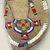 Blackfoot. <em>Child's Moccasin with Beaded Cross and Circle Design</em>, 1930s. Beads, sinew, cotton thread, 8 7/8 x 3 3/4 in. (22.5 x 9.5 cm). Brooklyn Museum, Gift of Mr. and Mrs. Jerome Blum, 66.86.25. Creative Commons-BY (Photo: Brooklyn Museum, CUR.66.86.25_view2.jpg)