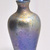 Tiffany Studios (1902-1932). <em>Bottle</em>, ca. 1901-1905. Opalescent glass, 3 x 1 3/4 x 1 3/4 in. (7.6 x 4.4 x 4.4 cm). Brooklyn Museum, Bequest of Laura L. Barnes, 67.120.62. Creative Commons-BY (Photo: Brooklyn Museum, CUR.67.120.62.jpg)