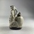  <em>Ape Holding a Vessel</em>, 7th–6th century B.C.E. Faience, 3 11/16 x 1 9/16 x 2 5/16 in. (9.3 x 4 x 5.8 cm). Brooklyn Museum, Charles Edwin Wilbour Fund, 67.1. Creative Commons-BY (Photo: Brooklyn Museum, CUR.67.1_right.JPG)
