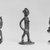 Akan. <em>Gold-weight (abrammuo): standing figure</em>. Brass, 2 13/16 x 1 5/16 x 1 in. (7.1 x 3.3 x 2.5 cm). Brooklyn Museum, Bequest of Laura L. Barnes, 67.25.3. Creative Commons-BY (Photo: , CUR.67.25.1_67.25.2_67.25.3_print_bw.jpg)