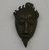 Akan. <em>Mask</em>. Brass, 1 5/8 x 1 x 3/8 in. (4.2 x 2.5 x 1 cm). Brooklyn Museum, Bequest of Laura L. Barnes, 67.25.5. Creative Commons-BY (Photo: Brooklyn Museum, CUR.67.25.5.jpg)