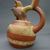 Moche. <em>Stirrup Spout Vessel with Bat Figure</em>, 400-500 C.E. Clay, slips, 8 1/4 x 5 1/4 x 6 3/4 in. (21 x 13.3 x 17.1 cm). Brooklyn Museum, Gift of Robert  L. Niles, 67.86.4. Creative Commons-BY (Photo: , CUR.67.86.4_view03.jpg)