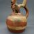 Moche. <em>Stirrup Spout Vessel with Bat Figure</em>, 400-500 C.E. Clay, slips, 8 1/4 x 5 1/4 x 6 3/4 in. (21 x 13.3 x 17.1 cm). Brooklyn Museum, Gift of Robert  L. Niles, 67.86.4. Creative Commons-BY (Photo: , CUR.67.86.4_view04.jpg)