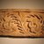 Coptic. <em>Recarved Plant Scroll with Snakes and Bird Heads</em>, Ancient, recut in the 20th century C.E. Limestone, 10 1/16 x 20 1/16 x 4 1/4 in. (25.5 x 51 x 10.8 cm). Brooklyn Museum, Charles Edwin Wilbour Fund, 68.3. Creative Commons-BY (Photo: Brooklyn Museum, CUR.68.3_unearthing_coptic.jpg)