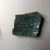  <em>Vessel Fragment</em>, 305 B.C.E.–395 C.E. Faience, 2 1/4 x 2 1/2 x 3/8 in. (5.7 x 6.3 x 1 cm). Brooklyn Museum, Anonymous gift, 69.112.12. Creative Commons-BY (Photo: , CUR.69.112.12_view02.jpg)
