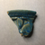  <em>Vessel Fragment</em>, 305 B.C.E.–395 C.E. Faience, 2 1/16 x 2 3/8 x 3/8 in. (5.2 x 6.1 x 1 cm). Brooklyn Museum, Anonymous gift, 69.112.13. Creative Commons-BY (Photo: , CUR.69.112.13_view01.jpg)