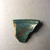  <em>Vessel Fragment</em>, 305 B.C.E.–395 C.E. Faience, 2 1/16 x 2 3/8 x 3/8 in. (5.2 x 6.1 x 1 cm). Brooklyn Museum, Anonymous gift, 69.112.13. Creative Commons-BY (Photo: , CUR.69.112.13_view02.jpg)