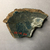  <em>Vessel Fragment</em>, 305 B.C.E.-395 C.E. Faience, 2 3/8 x 2 3/4 x 1/2 in. (6 x 7 x 1.2 cm). Brooklyn Museum, Anonymous gift, 69.112.20. Creative Commons-BY (Photo: , CUR.69.112.20_view02.jpg)