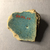  <em>Vessel Fragment</em>, 305 B.C.E.-395 C.E. Faience, 2 1/2 x 2 11/16 in. (6.3 x 6.8 cm). Brooklyn Museum, Anonymous gift, 69.112.27. Creative Commons-BY (Photo: , CUR.69.112.27_view02.jpg)