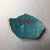  <em>Vessel Fragment</em>, 305 B.C.E.-395 C.E. Faience, 1 15/16 x 2 3/4 in. (5 x 7 cm). Brooklyn Museum, Anonymous gift, 69.112.31. Creative Commons-BY (Photo: , CUR.69.112.31_view02.jpg)