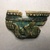  <em>Vessel Fragment</em>, 305 B.C.E.–395 C.E. Faience, 2 x 1 3/8 x 3/16 in. (5.1 x 3.5 x 0.5 cm). Brooklyn Museum, Anonymous gift, 69.112.8. Creative Commons-BY (Photo: , CUR.69.112.4_69.112.5_69.112.6_69.112.7_69.112.8_view01.jpg)