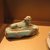 <em>Recumbent Calf</em>, ca. 1938-1700 B.C.E. or ca. 664-505 B.C.E. Faience, 1 11/16 x 3 1/16 x 1 1/4 in. (4.3 x 7.7 x 3.1 cm). Brooklyn Museum, Charles Edwin Wilbour Fund, 70.92. Creative Commons-BY (Photo: Brooklyn Museum, CUR.70.92_erg2.jpg)