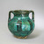  <em>Double-handled Jar</em>, 14th century. Glazed ceramic, 4 7/16 x 7 1/2 in. (11.3 x 19 cm). Brooklyn Museum, Gift of Elizabeth F. Babbott in memory of Dr. Frank L. Babbott, 71.113. Creative Commons-BY (Photo: , CUR.71.113_view01.jpg)