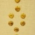 Greek. <em>Applique, Circular in Shape, with Female Face</em>, late 4th century B.C.E. Gold, 1/8 x 5/8 in. (0.3 x 1.6 cm). Brooklyn Museum, Gift of Mr. and Mrs. Thomas S. Brush, 71.79.177. Creative Commons-BY (Photo: Brooklyn Museum, CUR.71.79.172-.179_overall.jpg)