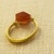 Greek. <em>Hoop Ring with Bead</em>, late 4th century B.C.E. Gold, carnelian, 13/16 x 3/4 in. (2.1 x 1.9 cm). Brooklyn Museum, Gift of Mr. and Mrs. Thomas S. Brush, 71.79.19. Creative Commons-BY (Photo: Brooklyn Museum, CUR.71.79.19_overall02.jpg)