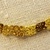 Greek. <em>Bead</em>, late 4th century B.C.E. Gold, 1/16 x 1/4 x 7/16 in. (0.2 x 0.6 x 1.2 cm). Brooklyn Museum, Gift of Mr. and Mrs. Thomas S. Brush, 71.79.39. Creative Commons-BY (Photo: Brooklyn Museum, CUR.71.79.27_-.39_detail02.jpg)
