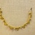 Greek. <em>Bead with Ribbed Tube and Flag</em>, late 4th century B.C.E. Gold, Tube: 1/4 in. (0.7 cm). Brooklyn Museum, Gift of Mr. and Mrs. Thomas S. Brush, 71.79.43. Creative Commons-BY (Photo: Brooklyn Museum, CUR.71.79.40-.55_overall01.jpg)