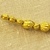 Greek. <em>Melon Shaped Bead Pierced Lengthwised with Plain Rim</em>, late 4th century B.C.E. Gold, 3/16 x 1/4 in. (0.5 x 0.6 cm). Brooklyn Museum, Gift of Mr. and Mrs. Thomas S. Brush, 71.79.73. Creative Commons-BY (Photo: Brooklyn Museum, CUR.71.79.56-.76_detail03.jpg)