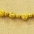 Greek. <em>Melon Shaped Bead Pierced Lengthwised with Beaded Rim</em>, late 4th century B.C.E. Gold, 1/4 x 5/16 in. (0.7 x 0.8 cm). Brooklyn Museum, Gift of Mr. and Mrs. Thomas S. Brush, 71.79.60. Creative Commons-BY (Photo: Brooklyn Museum, CUR.71.79.56-.76_detail05.jpg)