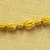 Greek. <em>Melon Shaped Bead Pierced Lengthwised with Plain Rim</em>, late 4th century B.C.E. Gold, 3/16 x 1/4 in. (0.5 x 0.6 cm). Brooklyn Museum, Gift of Mr. and Mrs. Thomas S. Brush, 71.79.71. Creative Commons-BY (Photo: Brooklyn Museum, CUR.71.79.56-.76_detail08.jpg)
