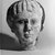  <em>Female Head</em>, 3rd century C.E. Limestone, plaster, pigment, 8 11/16 x 7 1/2 x 7 7/8 in. (22 x 19 x 20 cm). Brooklyn Museum, Charles Edwin Wilbour Fund, 71.87. Creative Commons-BY (Photo: Brooklyn Museum, CUR.71.87_NegA_bw.jpg)